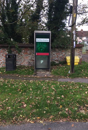 Newton Toney Wiltshire village image of defribulator located in the high street