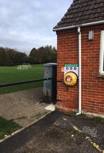 Newton Toney Wiltshire village image of defribulator on the Memorial Hall