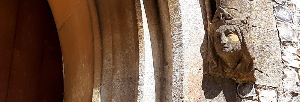 Newton Toney Wiltshire village image showing a church doorway